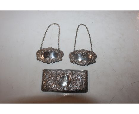 Two silver decanter labels for "Brandy" and "Gin" and a silver card holder 