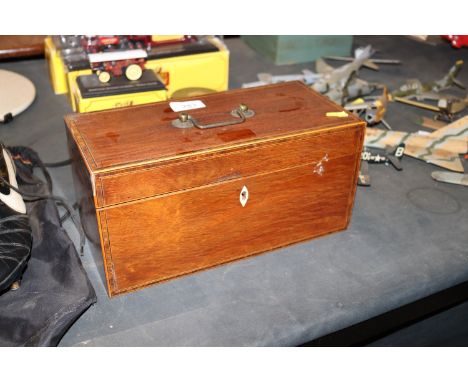 A mahogany and inlaid two compartment tea caddy with integral mixing bowl