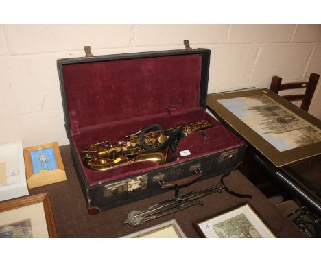 A 'The Aristocrat' saxophone by Elkhart in fitted case with stand