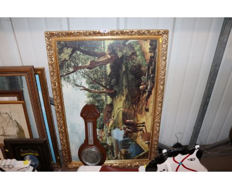 A carved oak barometer and a coloured print after Constable 