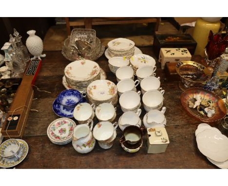 A quantity of Colclough tea ware, floral decorated tea ware, various silver plated flatware, glass bowls, etc. 