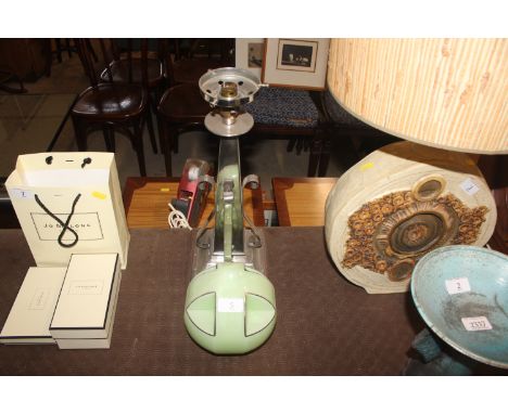An Art Deco chrome table lamp with green and silvered glass globular shade 