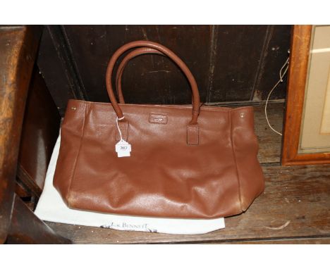 A Poole Costello leather handbag and cloth bag 
