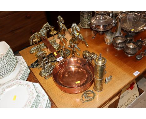 A quantity of brass and copper to include solid brass ornaments, horse brasses, candlesticks, copper pan, Eastern grinder 