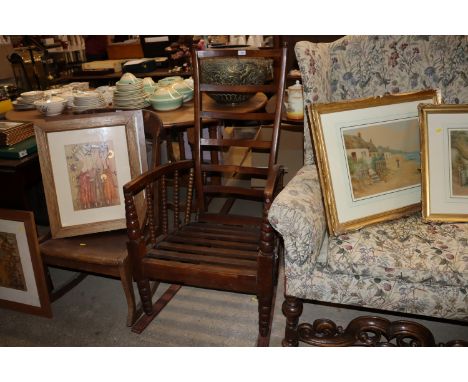An oak adjustable ladder back rocking chair 