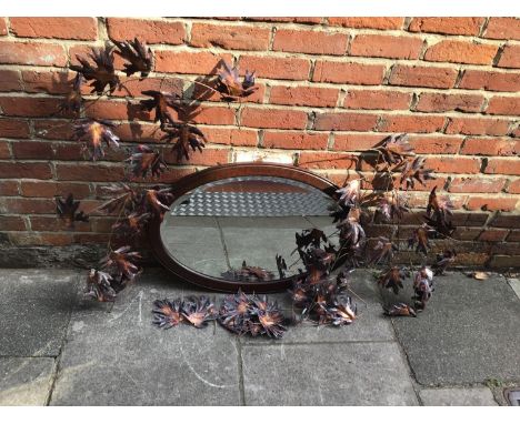 A copper and wire maple leaf wall art / arch hanging, together with an oak oval bevelled mirror (2) 