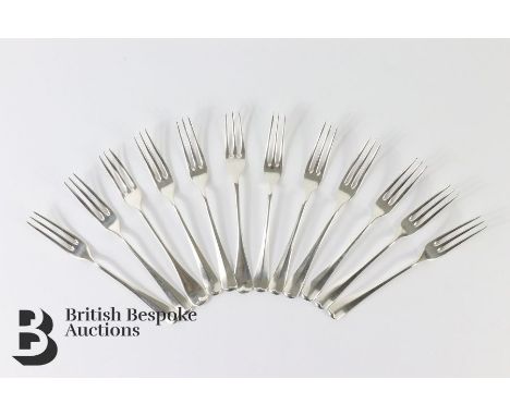 Twelve large silver Rat Tail Hanoverian three-pronged forks, dated 1971, approx 910 gms