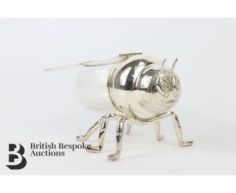 Silver plated novelty honey pot, 21st century, approx 15 x 9 cms. Note: tiny chip to the rim of the glass bowl. 