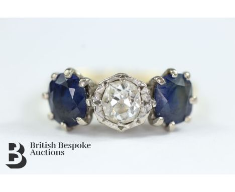 Antique 18ct yellow gold, sapphire and diamond ring. The ring set with an old-cut diamond approx 30 pts flanked by two royal 