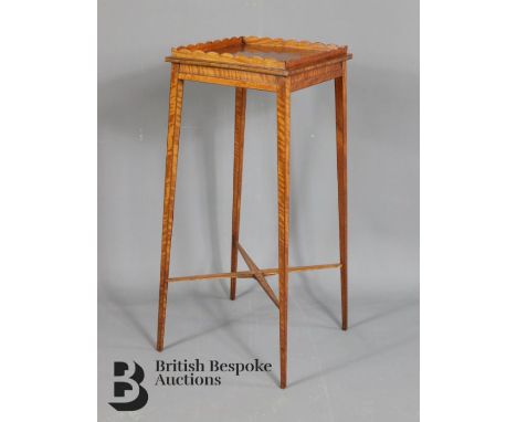 A satinwood urn stand in George III style. The stand having a square top on square tapered legs, approx. w 31cm x h 73cm.