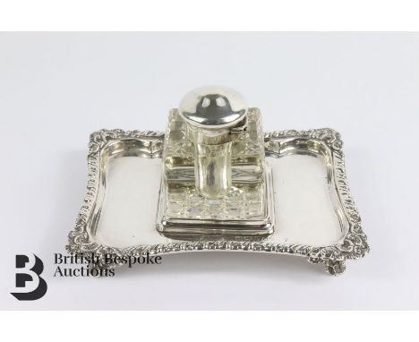 Single silver ink stand, with a cut-glass inkwell, Birmingham hallmark, dated 1977, approx 14 w x 10.5 cms.&nbsp;