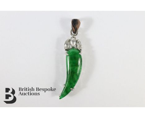 14ct white gold, jade and diamond pendant, set with a fruit-form jade piece approx 7 x 25mm, 2.9 gms.&nbsp;