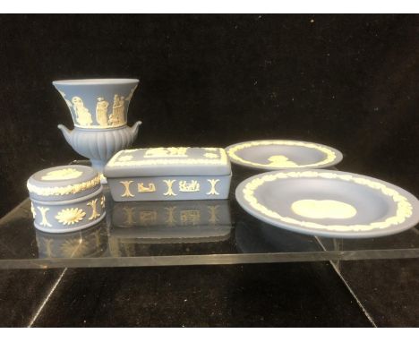 Wedgwood - Five items of blue sold jasper, comprising two handled urn vase, rectangular trinket box and cover; circular pin b