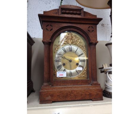 BRASS DIAL OAK MANTEL CLOCK. H40CM