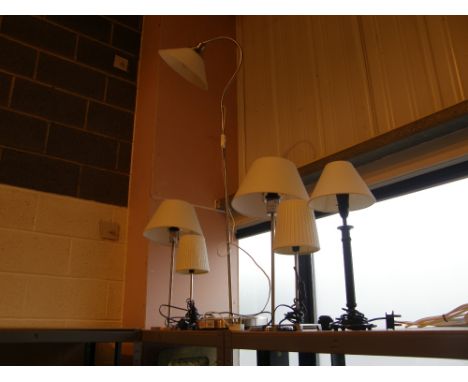 Brushed steel effect standard lamp plus two matching table lamps plus three others, all cream/white shades