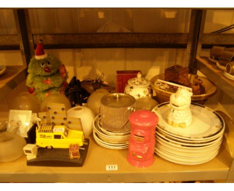 Mixed shelf of pottery, lampshades, vases and Del Boys reliant