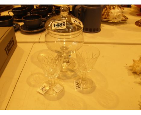 Pair of Royal Doulton cut crystal sherry glasses and a lidded glass bonbon jar on knopped stem and circular foot 