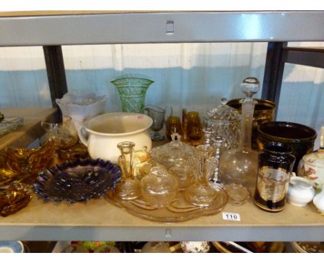 Shelf of glassware and ceramics including Carnival glass, decanter, chamber pot etc