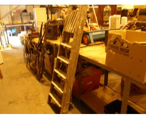 Two pairs of wooden step ladders, one 8 tread and one 6 tread