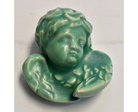 Carter and Co Poole of London Pottery wall hanging cherub/angel head in green, marked to backCondition: Minor chip to top of 