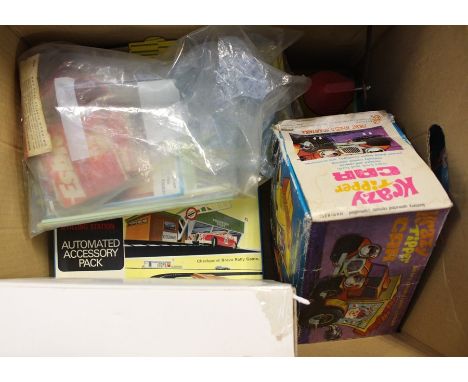 A collection of assorted toys to include: Marx Krazy Tipper Car; Minic Automated Accessory Pack Rally Checkpoint &amp; Fillin