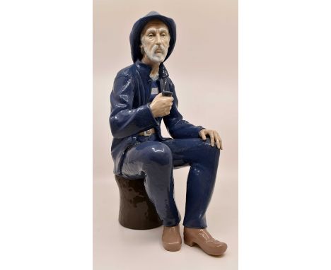 Large Nao figure of a fisherman smoking on a pipeCondition: No obvious signs of damage or restoration 