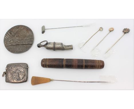 A Lusitania bronze medal, a silver stamp case, a German Army whistle, a needle case, plus hat pins etc