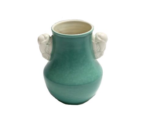 Poole Pottery vase by John Adams, pale green glaze and two cream glazed handles as doves, marked to the base, 21 cms tall app