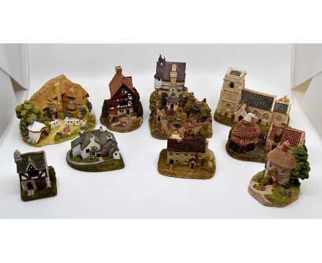 A Lilliput Lane collection of cottage figures, including Tuck Shop, Four Seasons, Dale Farm, Dove Cottage, The Golden Jubilee