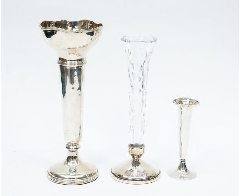 A silver candle stick, fancy shaped rim, height approx. 210mm, Birmingham 1912, maker E.S Barnsley & Co, total gross weight a