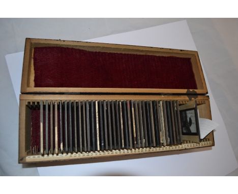 A collection of 36 Glass Magic Lantern Slides featuring scenes from New Zealand, 1870 -1920. Includes Cricket match, Gold Min