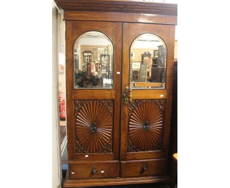 Late 19th, early 20th Century Continental oak cupboard with two doors, mirrored above two single drawers and carved panel det