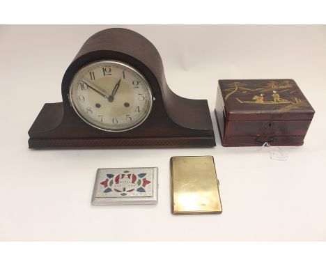 An early 20th Century eight day mantle clock, a Japanese box, a 1947 cigarette case, from Africa plus a further cigarette cas