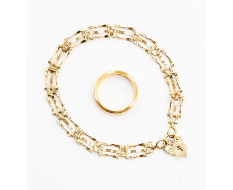 A 22ct gold ring, size L1/2, weight approx. 5.7gms and a 9ct gold gate bracelet with padlock clasp, weight approx. 3.6gms (2)