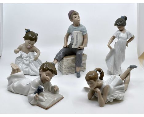 Collection of five Nao figures of young boys and girls.