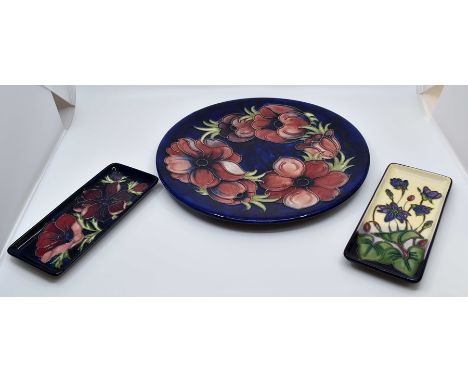 Late 20th Century Moorcroft wall plate marked 1/200 and two pin dishes Condition: No obvious signs of damage or restoration t