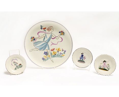 Poole Pottery charger, decorated with a leaping Art Deco style lady and flowers, 31 cms in diameter together with three furth