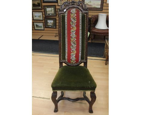 A Victorian Irish carved oak hall chair, carved floral top, tapestry and velvet back and seat, raised cabriole chair united w