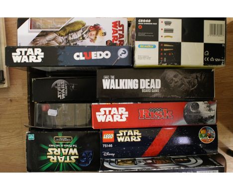 A mixed collection of various items to include; a Star Wars quantity of games, DVDs, 13" Chewbacca, Lego Advent 2016, Forceli