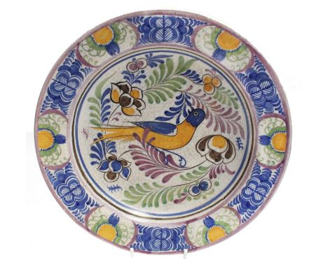 Poole pottery  662 charger with bird design, circa 1930s, marked and signed SY to base, 31 cm in diameterCondition: Glaze has