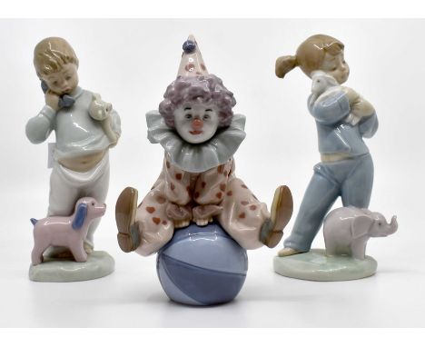 Lladro figure of a clown along with two Nao figuresCondition: No obvious signs of damage or restoration