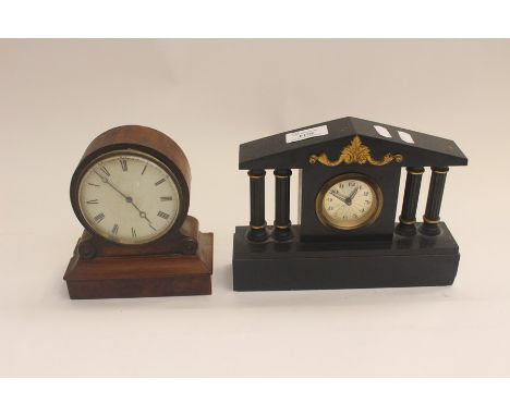 A Jurghans brass cased carriage clock with musical chime AF together with another mantel clock, with applied acorn and oak le