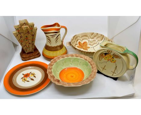 A collection of Art Deco Myott hand painted ceramics, comprising jug, vase, circular shaped jug, two handled bowl, cabinet pl