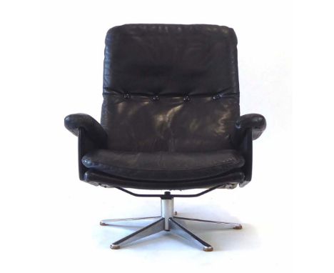 Werner Lagenfeld for Esa, a Danish black leather and button upholstered armchair on a polished aluminium swivel base