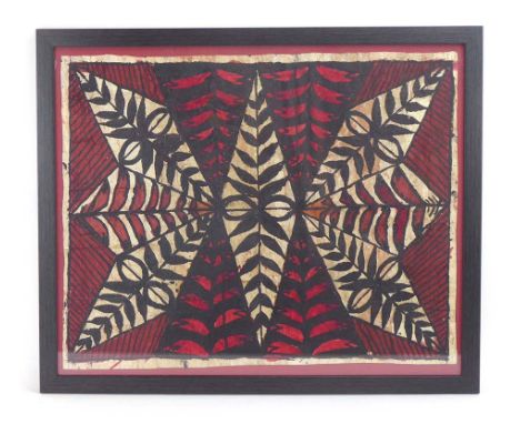 A Maori artwork of traditional geometric design in shades of black and red on fibrous paper, 50.5 x 63.5 cm CONDITION REPORT: