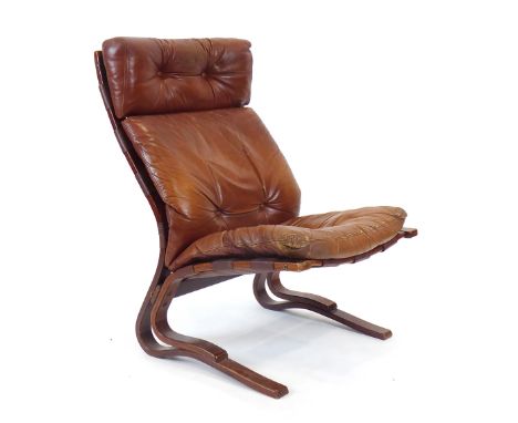 A 1970's brown leather and button upholstered 'Siesta' chair on a bentwood frame designed by Ingmar Relling for Westnofa