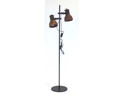 A 1970's twin-spot standard lamp with brown ceramic shades on a black shaft CONDITION REPORT: Working order unknown, will req