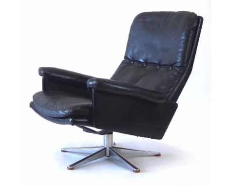 Werner Lagenfeld for Esa, a Danish black leather and button upholstered armchair on a polished aluminium swivel base