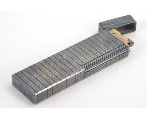 A 1960's/70's Dupont silver plated lighter of elongated rectangular form with hatched decoration, l. 14 cm CONDITION REPORT: 
