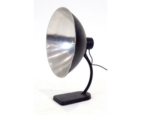 A 1960's-type black enamelled desk lamp with a large open shade